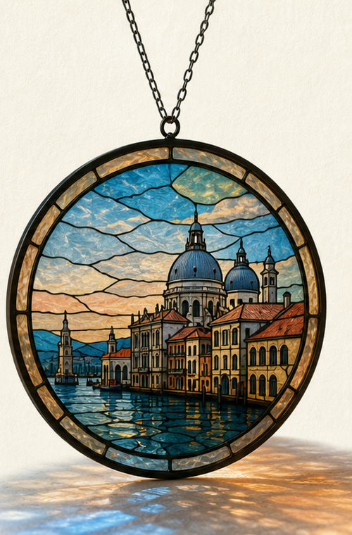 Finished round UV-printed glass keepsake hanging in warm light